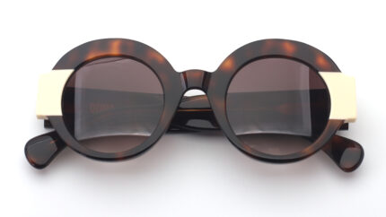gafa de pasta de acetato redonda femenina de color marron havana con detalles en crudo