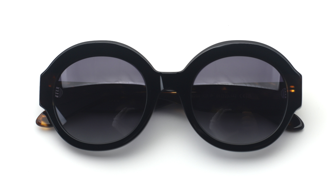 gafas de sol redondas de mujer en color negro y havana